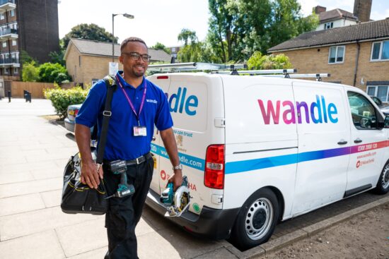 Wandle Repairs Man walking in front of van