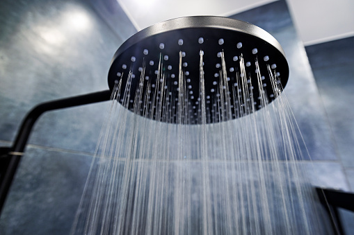 Shower head on.